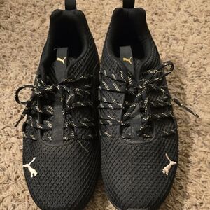 Puma Black Mesh Sneakers with Gold Accents